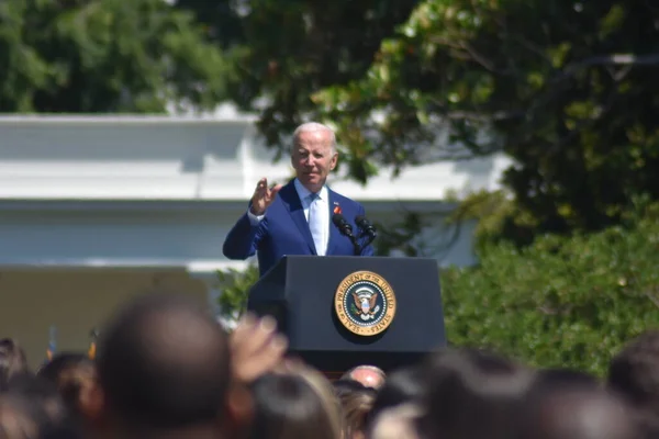 President Biden speaking at podium